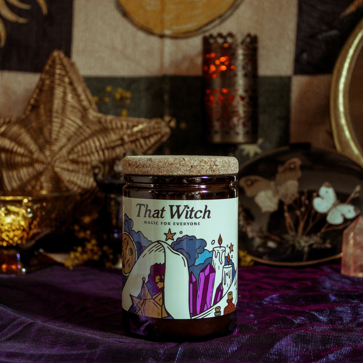 Jar labeled 'That Witch' on a mystical background with celestial decorations.