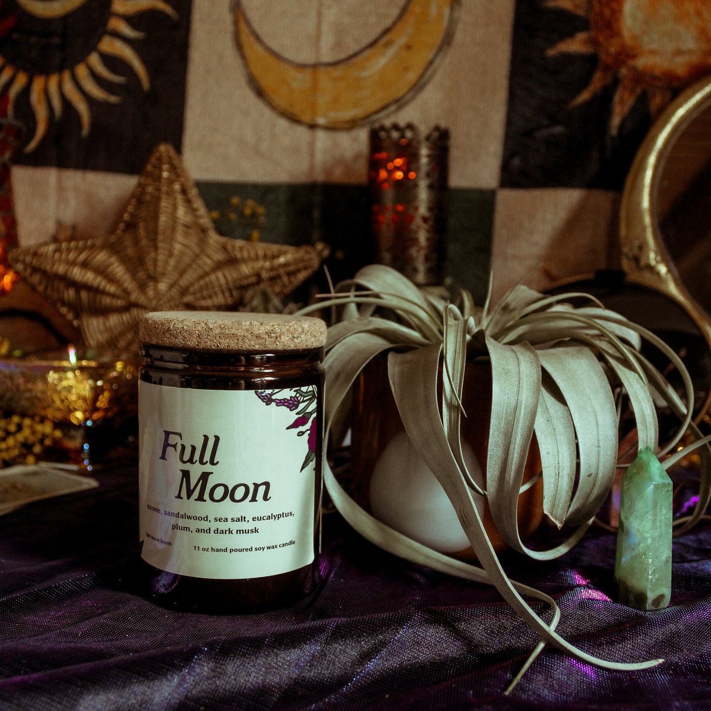 Jar labeled 'Full Moon' on a mystical background with candles and stars.