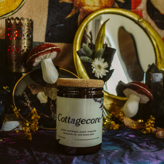 Cottagecore product jar with decorative background featuring mushrooms and mirrors.